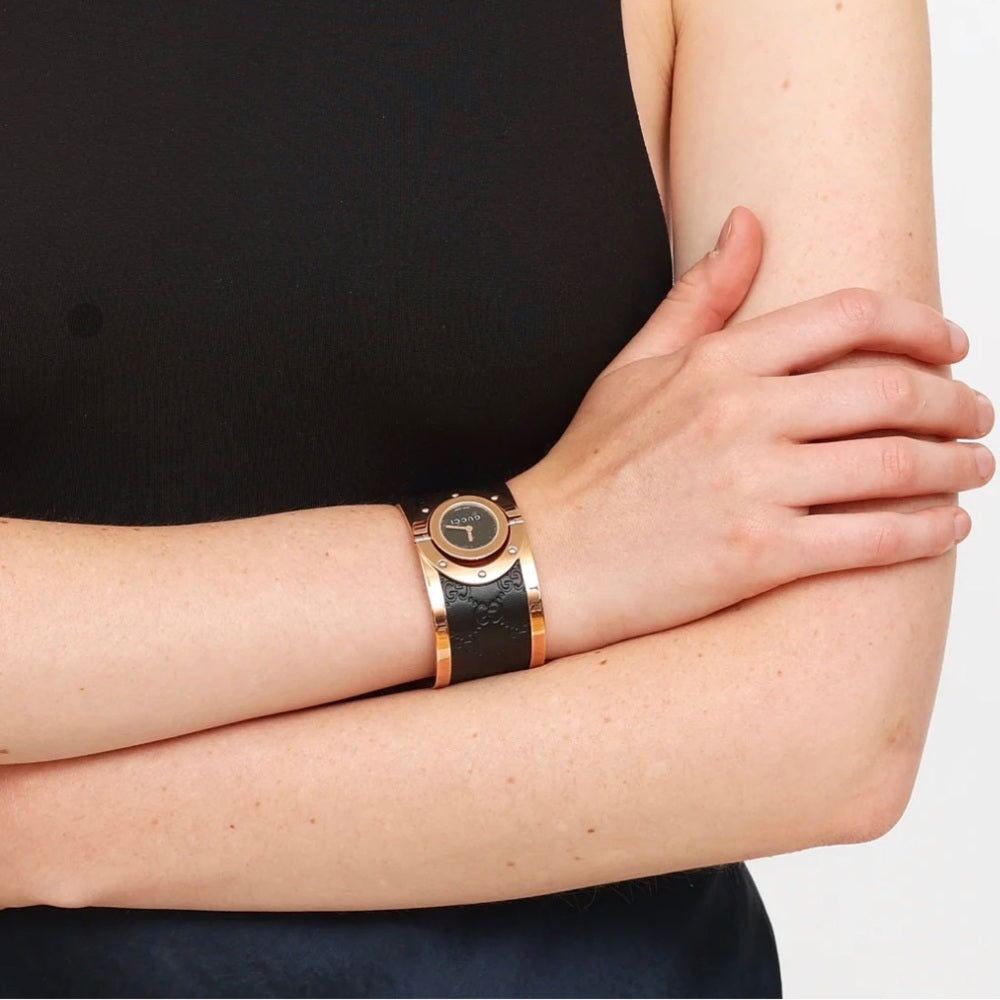GUCCI COLLECTORS WATCH 
Twirl Quartz Gold Dial Two Tone Bangle Ladies Watch