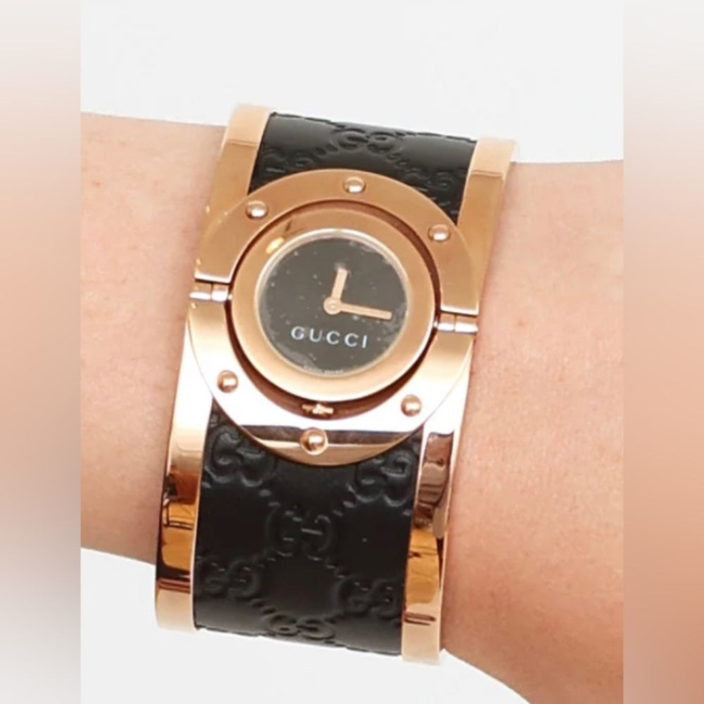 GUCCI COLLECTORS WATCH 
Twirl Quartz Gold Dial Two Tone Bangle Ladies Watch