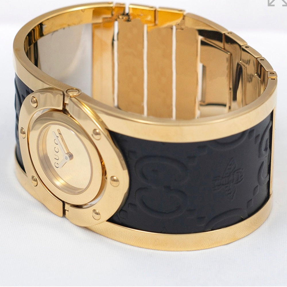 GUCCI COLLECTORS WATCH 
Twirl Quartz Gold Dial Two Tone Bangle Ladies Watch