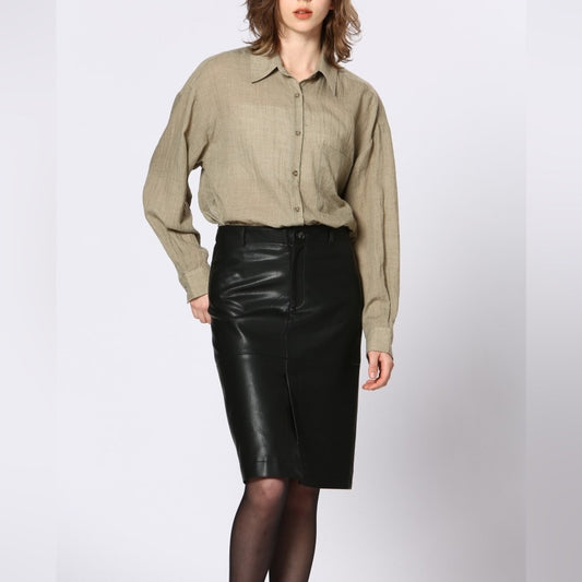 64. Soft Vegan leather skirt with a slit in the front and the back.