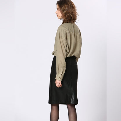 64. Soft Vegan leather skirt with a slit in the front and the back.