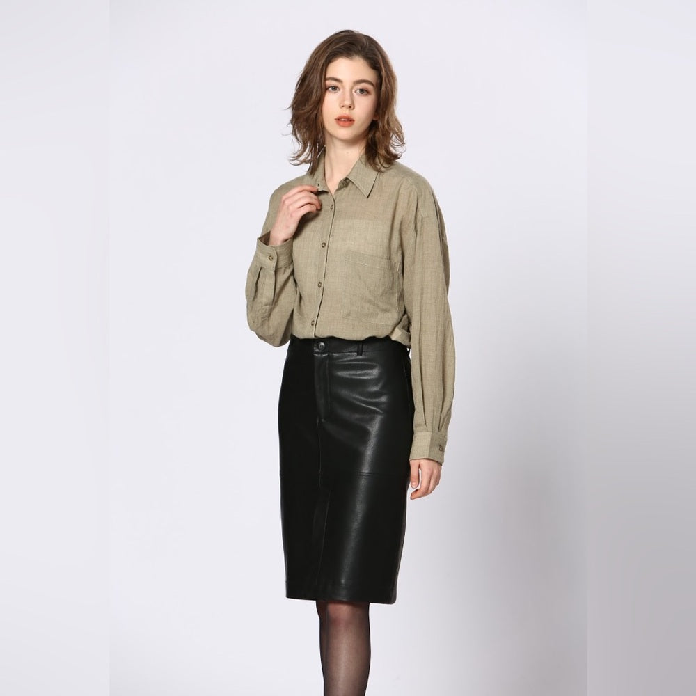 64. Soft Vegan leather skirt with a slit in the front and the back.